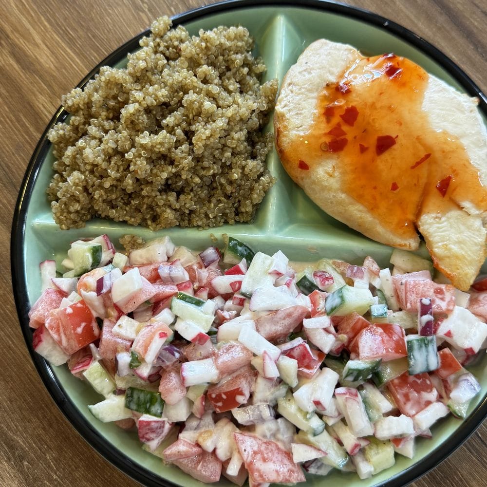 Chicken with quinoa and fresh salad